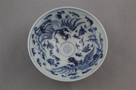 A Chinese blue and white dragon and phoenix bowl, Yongle four character mark to the interior, 15cm.